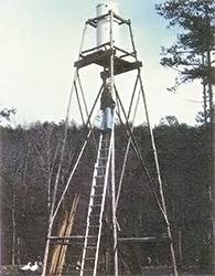 
The 250 gallon water tank the Megnins filled every day, with their car engine driving the water pump
